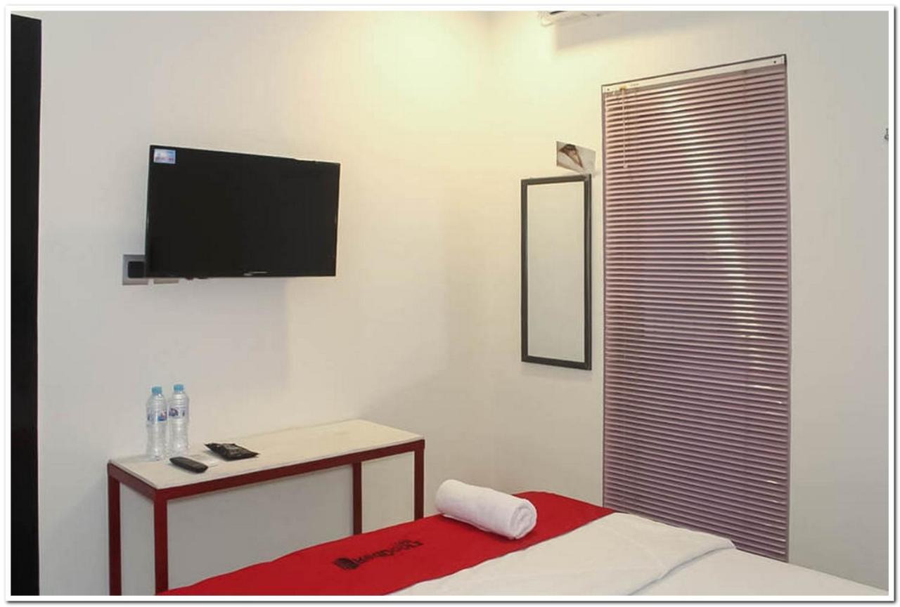 فندق Reddoorz @ Paus Raya بالانجكارايا المظهر الخارجي الصورة